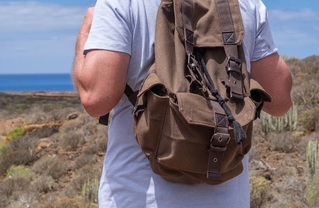 A close-up shot of a hiker's backpack, showcasing various features like hydration pack compatibility, multiple compartments, and durable straps.