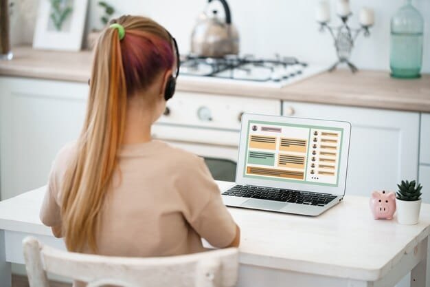A person sitting at a desk with multiple browser windows open, each displaying different prices for the same product from various online retailers
