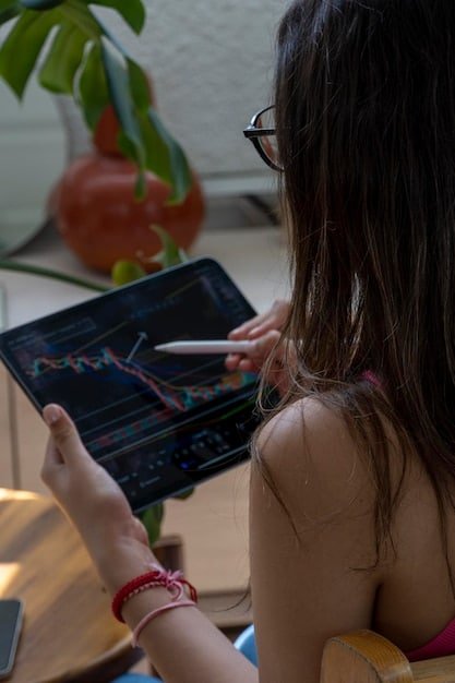 A close-up view of a computer screen displaying complex AI algorithm code analyzing consumer shopping behavior, with graphs and charts illustrating data patterns and predictive analytics.