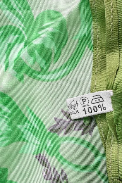 A close-up shot of a GOTS (Global Organic Textile Standard) certification label on a cotton garment, emphasizing the importance of sustainable and certified materials in ethical fashion.